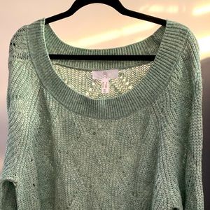 Beautiful light green knitted sweater